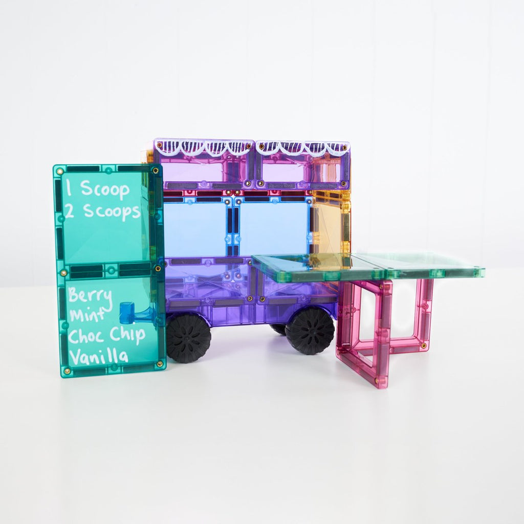 Pastel ice-cream van built from CONNETIX magnetic tiles with a hand-written flavour menu and serving counter