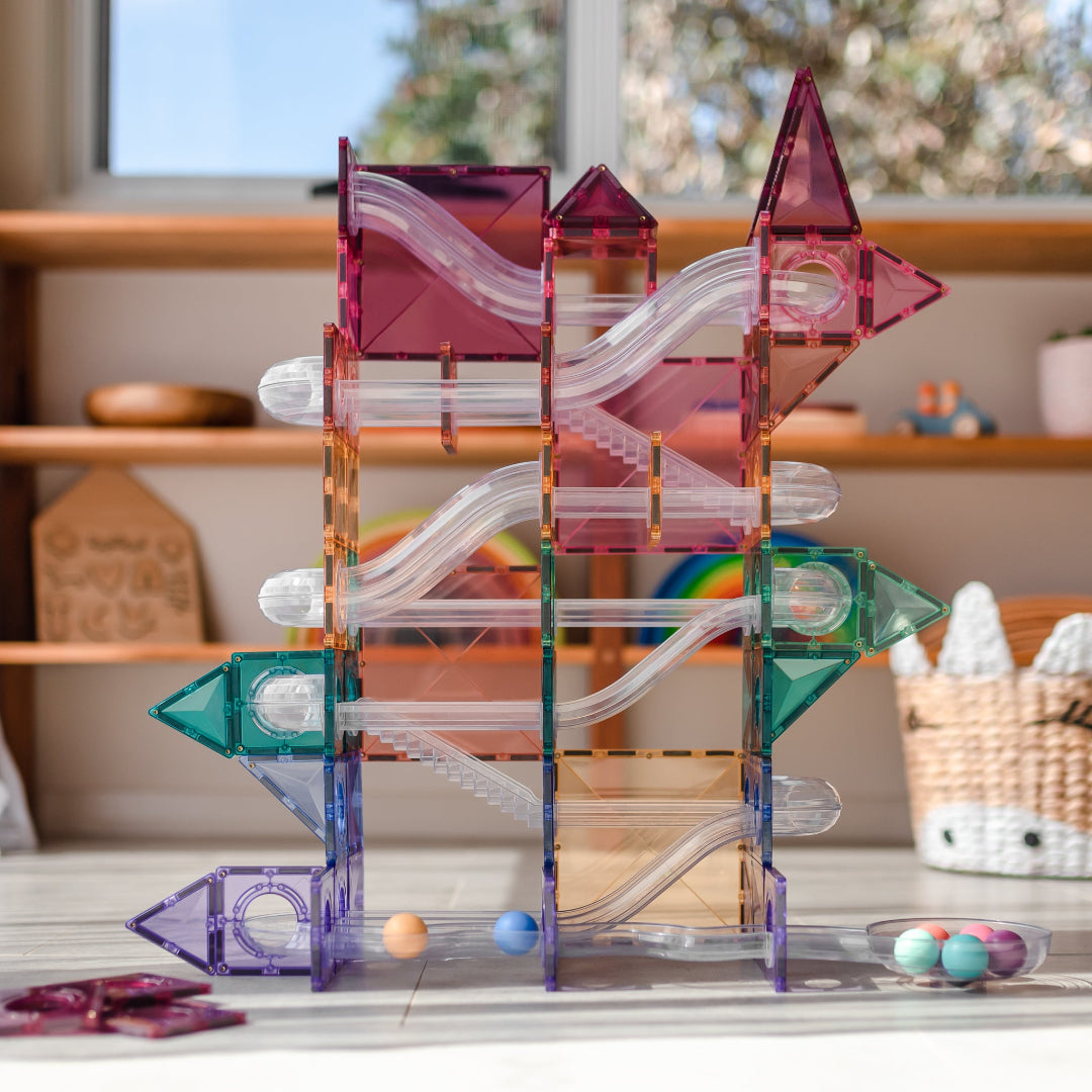 Large pastel CONNETIX ball run built by combining several CONNETIX packs