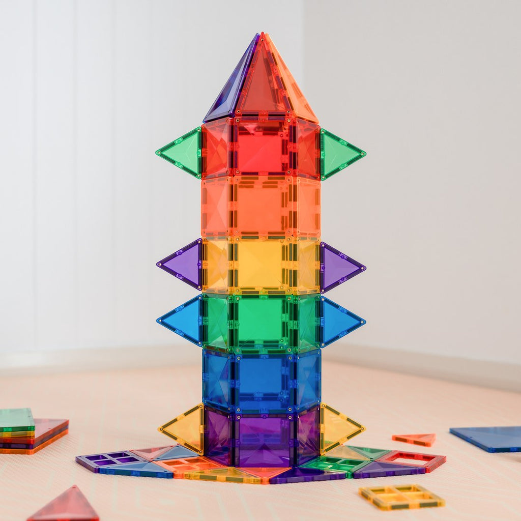 Tall rainbow tower built from CONNETIX magnetic tiles with triangle fins