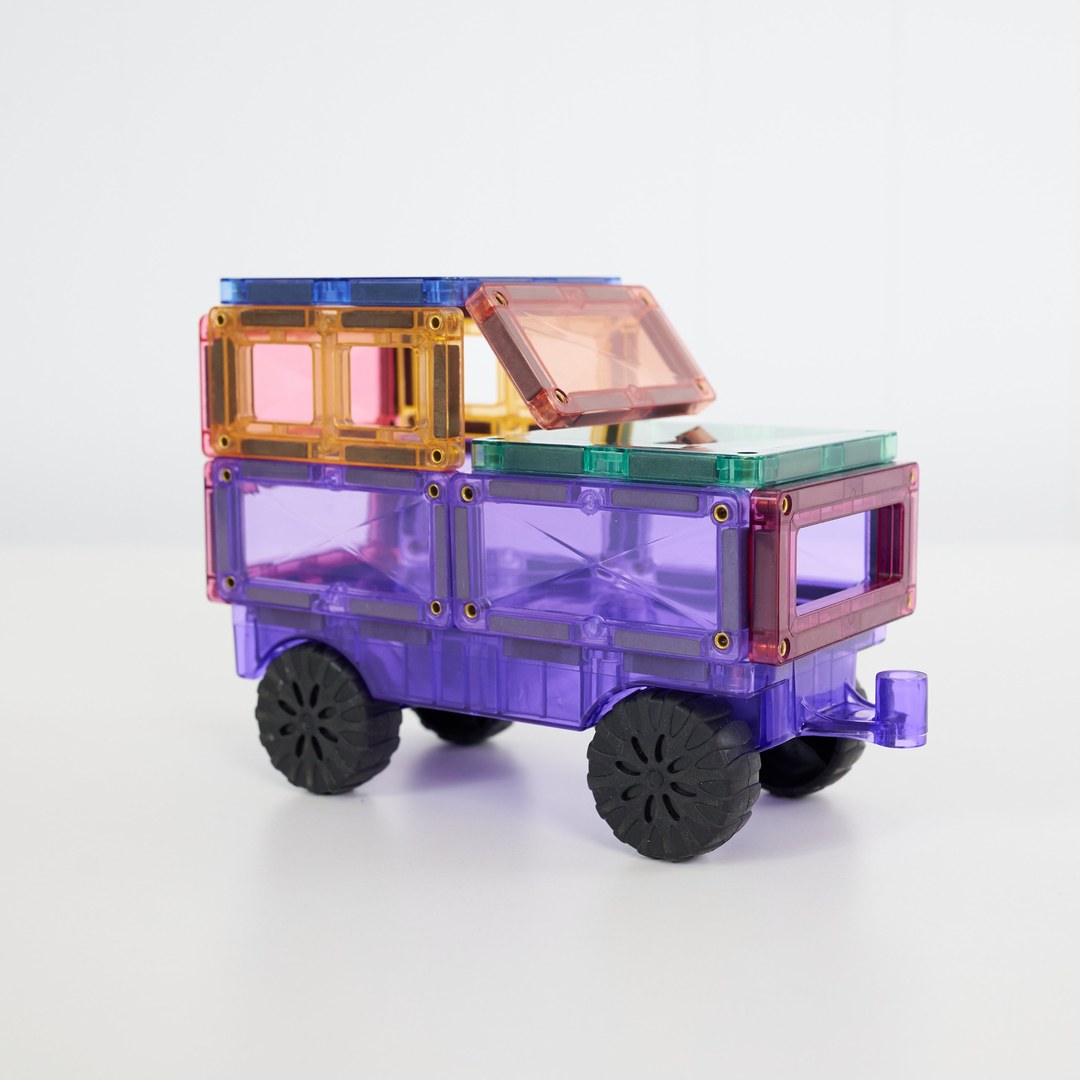 Pastel CONNETIX magnetic tile car with window tiles and black rubber wheels