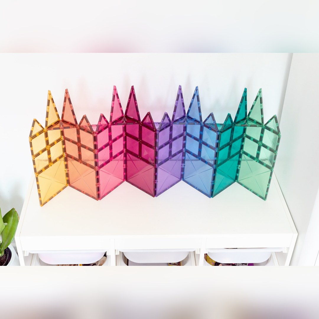 Zigzag wall of pastel CONNETIX squares and triangles in a gradient of colours