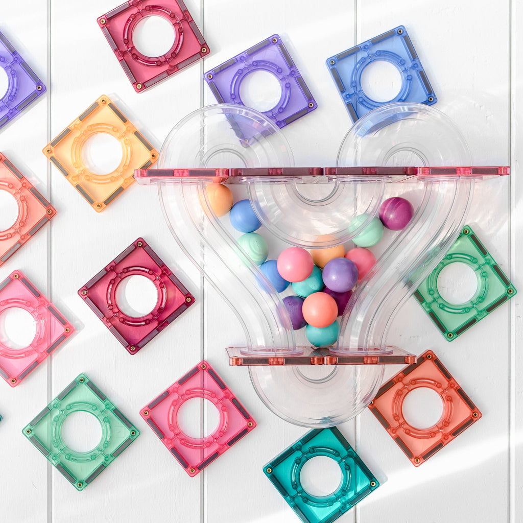 Pastel CONNETIX ball run maze with clear tubes and colourful wooden balls