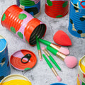 Block Design Tinned Goods make-up set with five colourful brushes and a sponge in a baked beans style tin