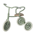 Maileg mouse tricycle in green with cream tyres and a wooden seat