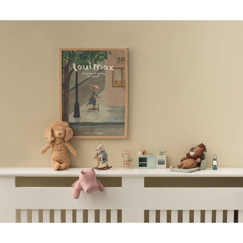 Maileg mice and plush toys on a radiator shelf with the mint kitchen counter and a Louimax poster