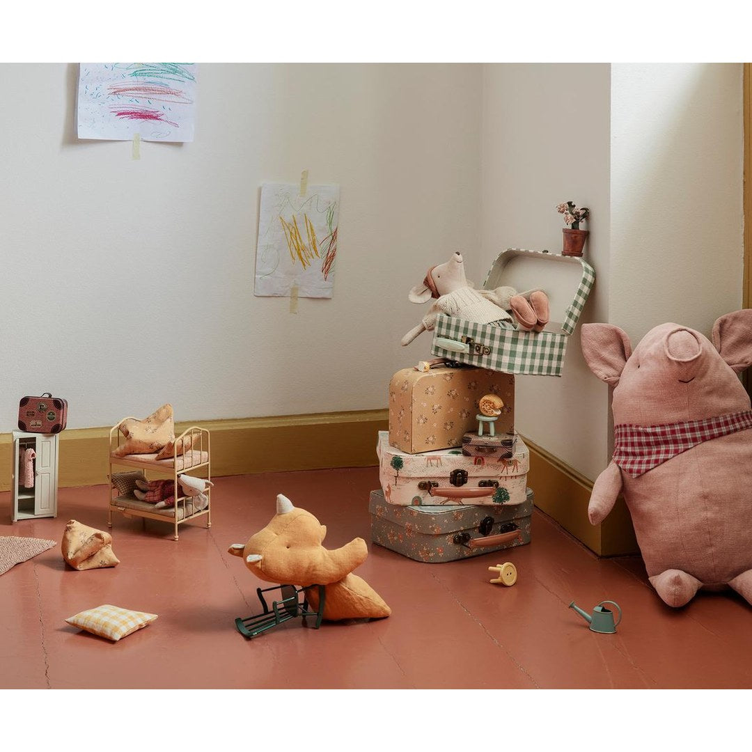 Maileg playroom with a mouse in a suitcase stack, the bunk bed, a plush pig and a fox on the floor
