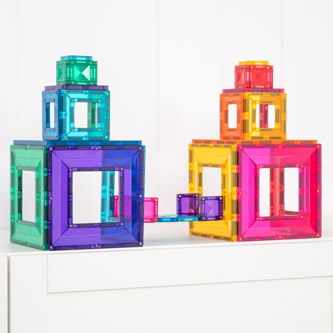 Two rainbow towers built from CONNETIX open-frame portal tiles