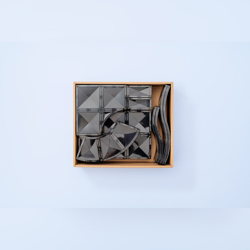 Black CONNETIX road tiles neatly packed in their storage box