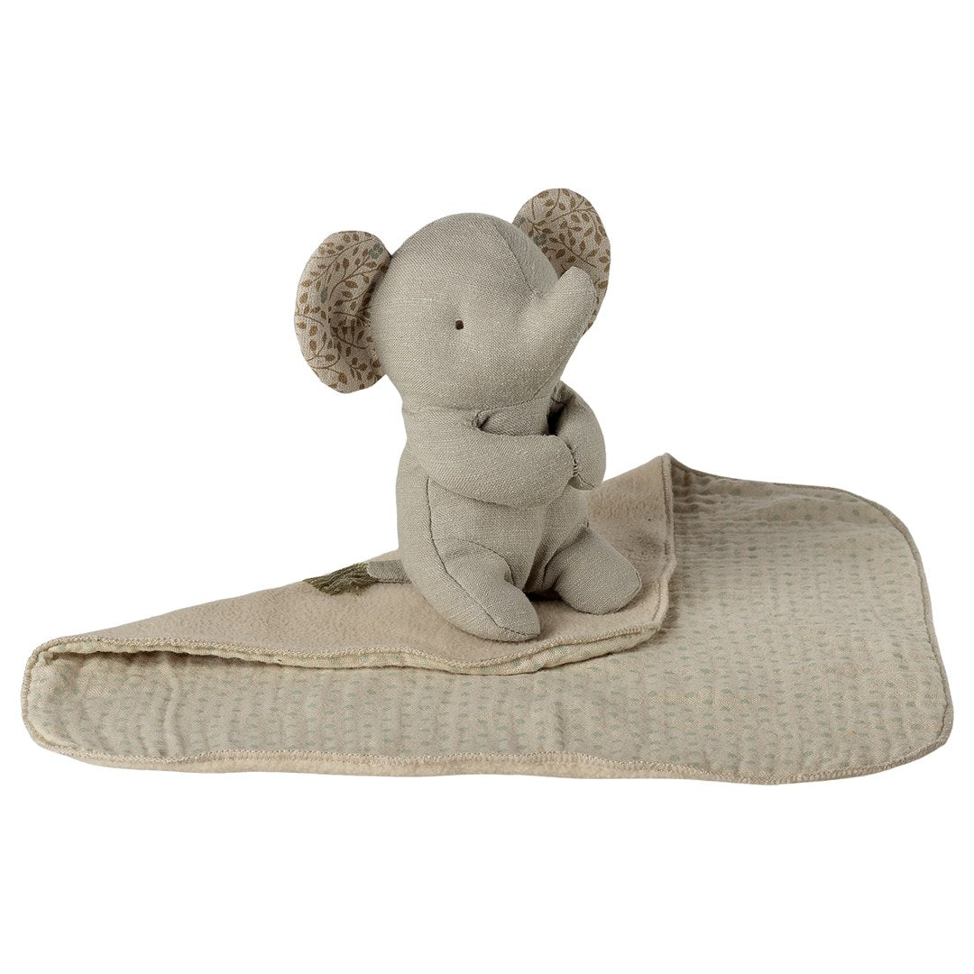 Maileg Lullaby Friends grey elephant sitting on its folded muslin blanket