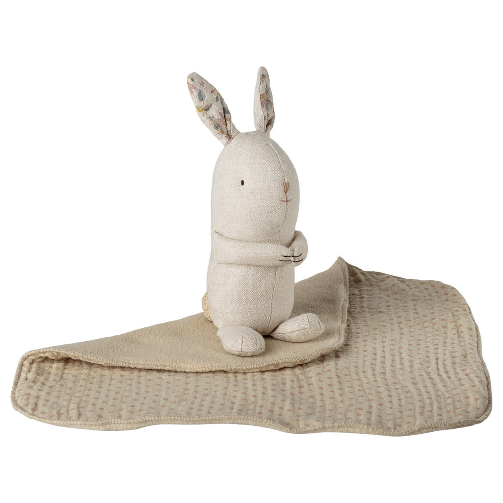 Maileg Lullaby Friends bunny with floral ears sitting on its muslin blanket