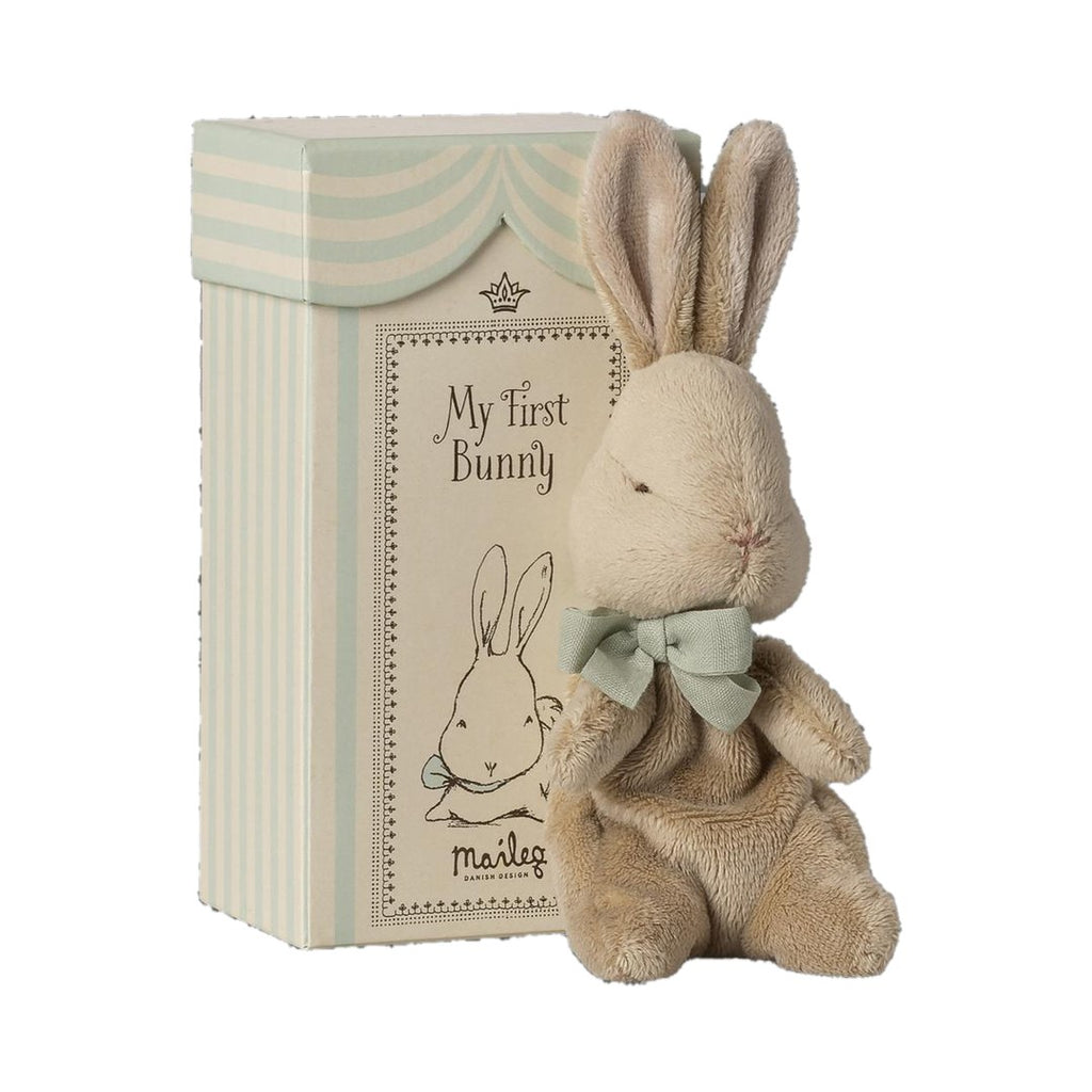 Maileg My First Bunny in mint with a mint bow, beside its striped gift box