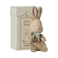 Maileg My First Bunny in mint with a mint bow, beside its striped gift box