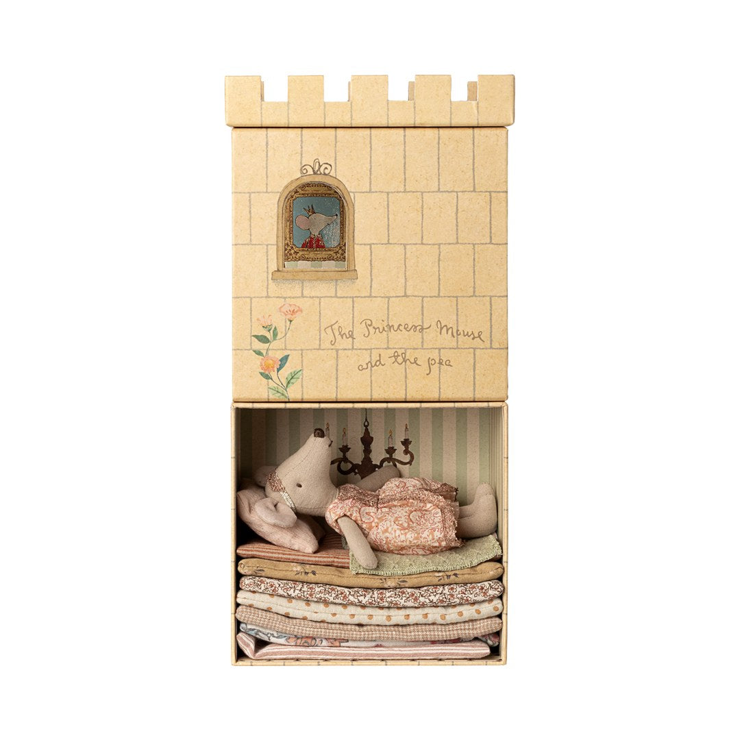 Maileg princess mouse asleep on a stack of mattresses inside the castle tower box