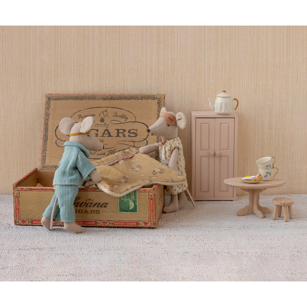 Maileg Mum and Dad mice making their cigar box bed with a mini wardrobe and tea table