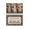 Maileg Triplets baby mice in pink, blue and yellow checked rompers lying in a matchbox, Triplets matchbox lid below