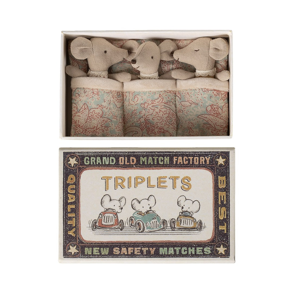 Maileg Triplets baby mice tucked under paisley quilts in their matchbox bed with the Triplets lid