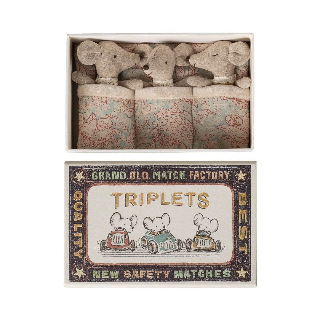 Maileg Triplets baby mice tucked under paisley quilts in their matchbox bed with the Triplets lid