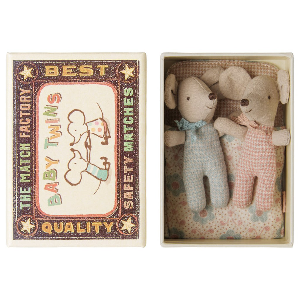 Maileg Twins baby mice in blue and pink checked rompers lying in a matchbox bed, Baby Twins matchbox lid beside