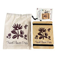 Travel flower press with floral design and matching drawstring bag on a white background
