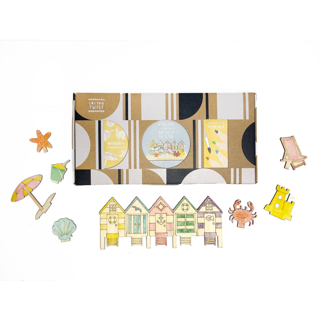 Set of beach-themed craft kit with box on white background