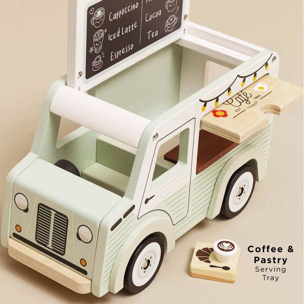 Wooden toy coffee truck with a serving tray on a beige background