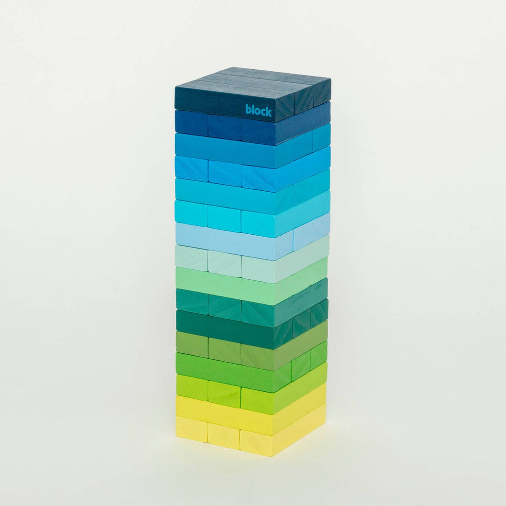 Block Design Warm Gradient Tower, a wooden tumbling tower game with painted blocks in a pink, coral and red gradient, image 8
