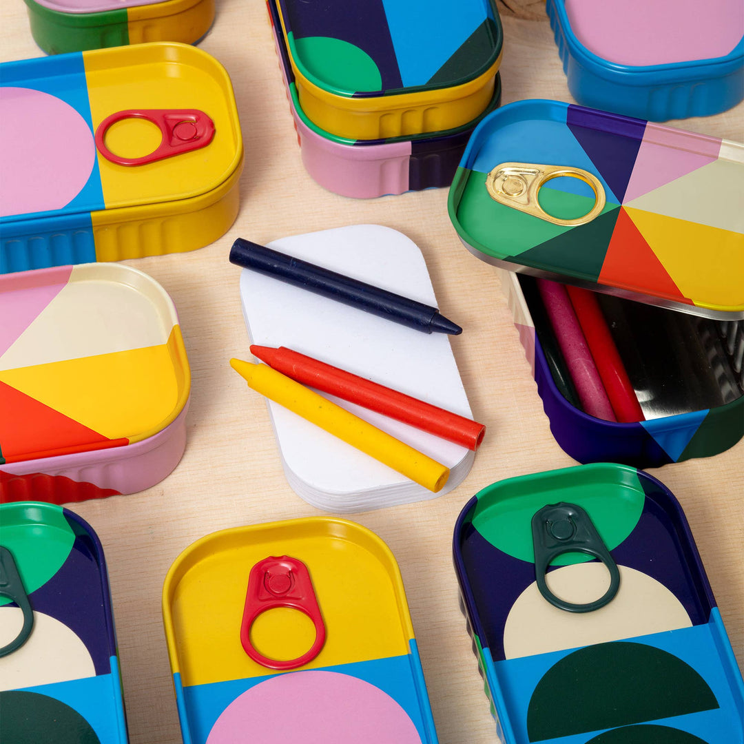 Block Design Tinned Goods kids' travel art set with wax crayons and a drawing pad in a colourful tin