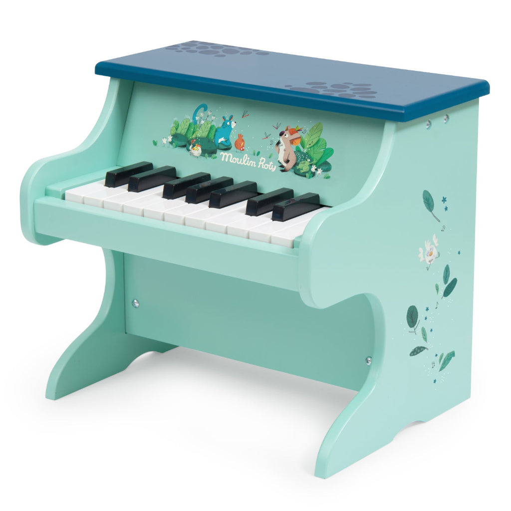 Children's toy piano with cartoon characters on a white background