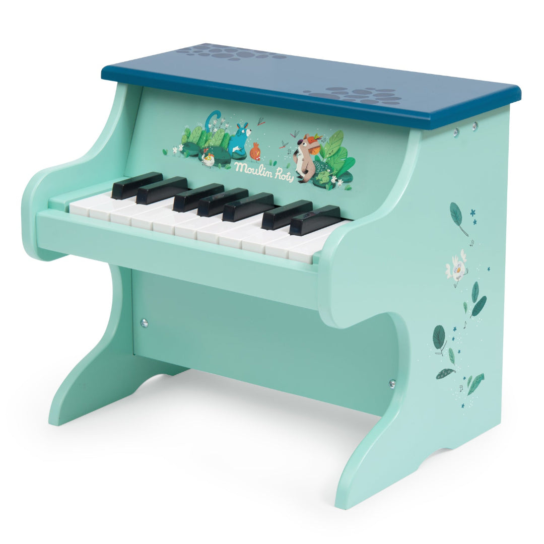 Children's toy piano with cartoon characters on a white background