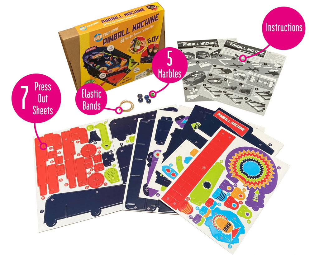 Pinball machine toy set with packaging, marbles, press-out sheets, and instructions on a white background.