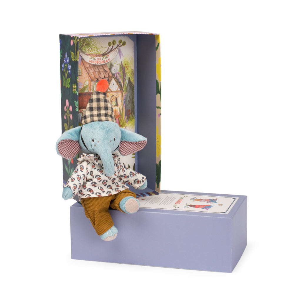Stuffed elephant toy in a decorative box with a colorful interior