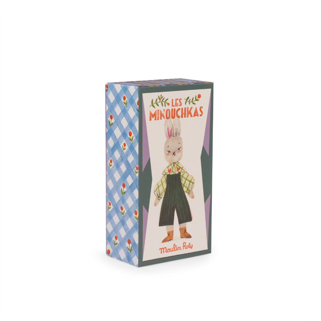 Box of 'Les Petits Minouchkas' with a cartoon character on a white background