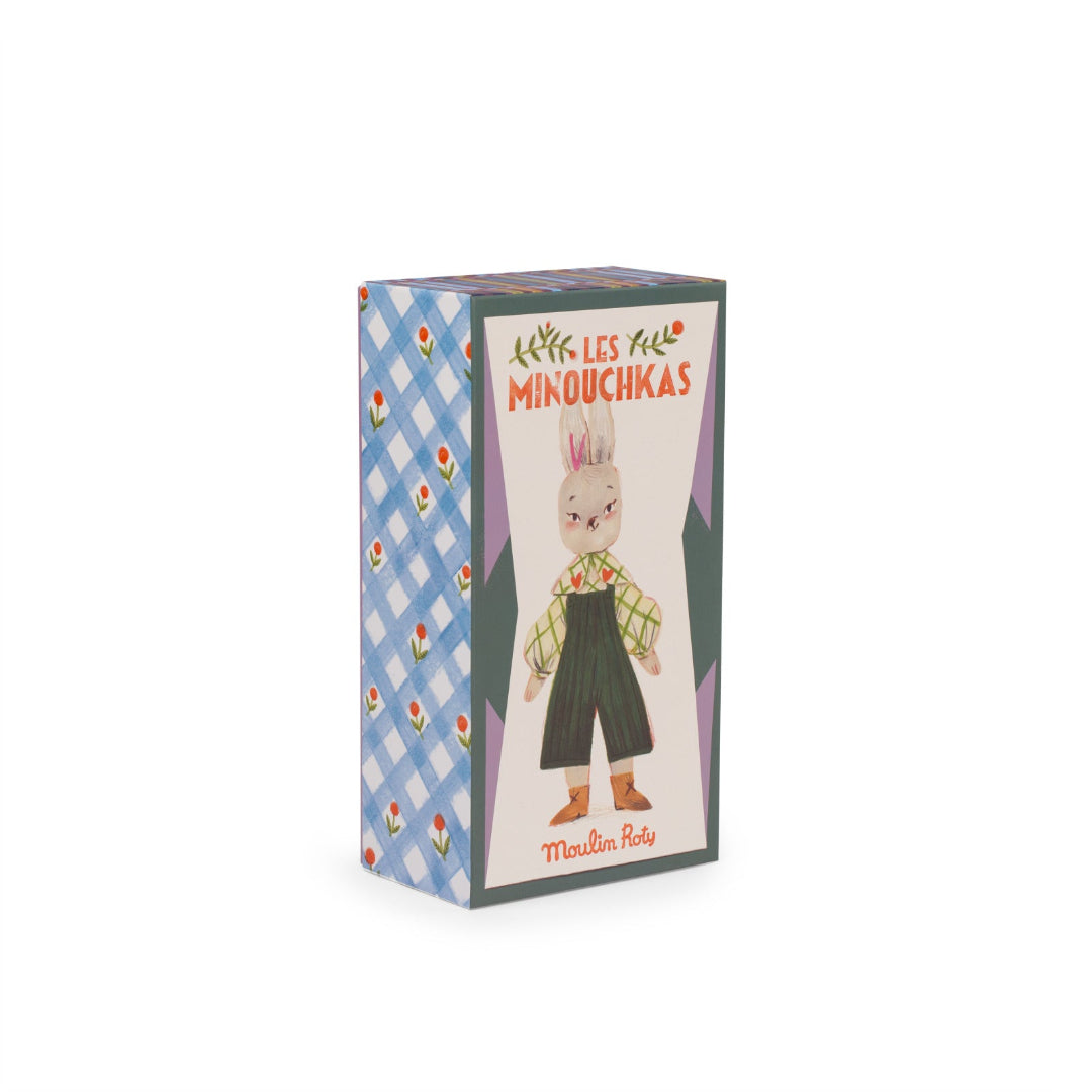 Box of 'Les Petits Minouchkas' with a cartoon character on a white background