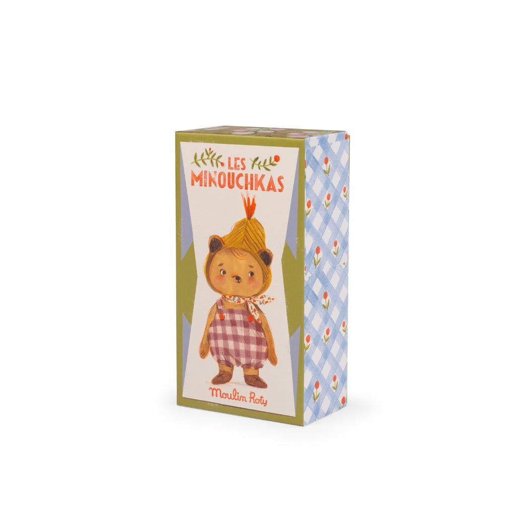 Product packaging with a character design and text on a white background