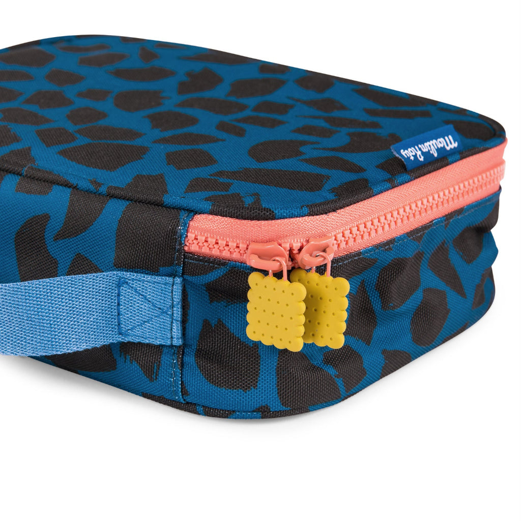 Blue and black patterned lunch box with pink zipper and yellow tags on a white background