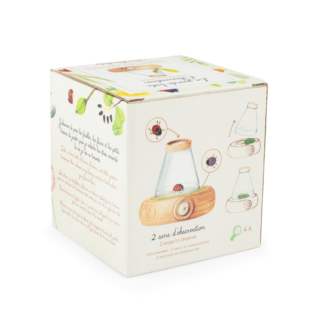 Product packaging with illustrations of a wooden and glass device on a white background