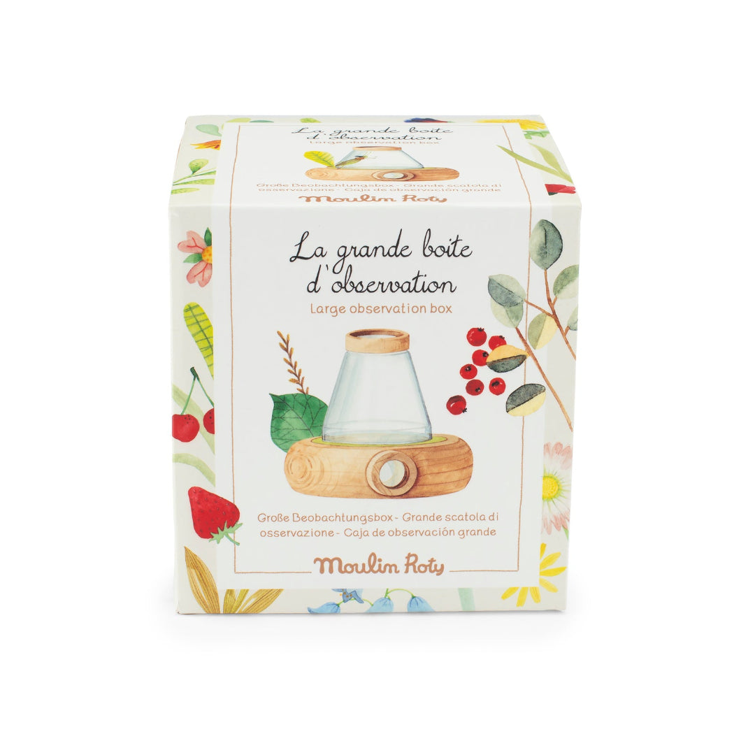 Moulin Roty observation box packaging with botanical design on a white background