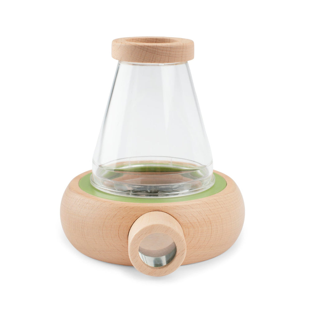 Glass container with wooden base and lid on a white background