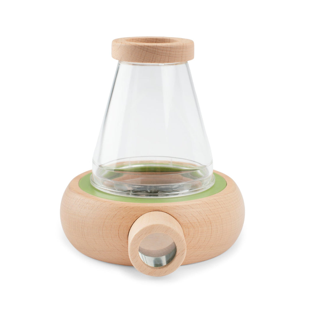 Glass container with wooden base and lid on a white background