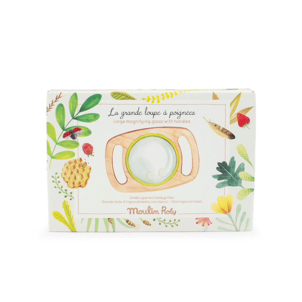 Packaging of a large magnifying glass with handles featuring botanical designs on a white background.