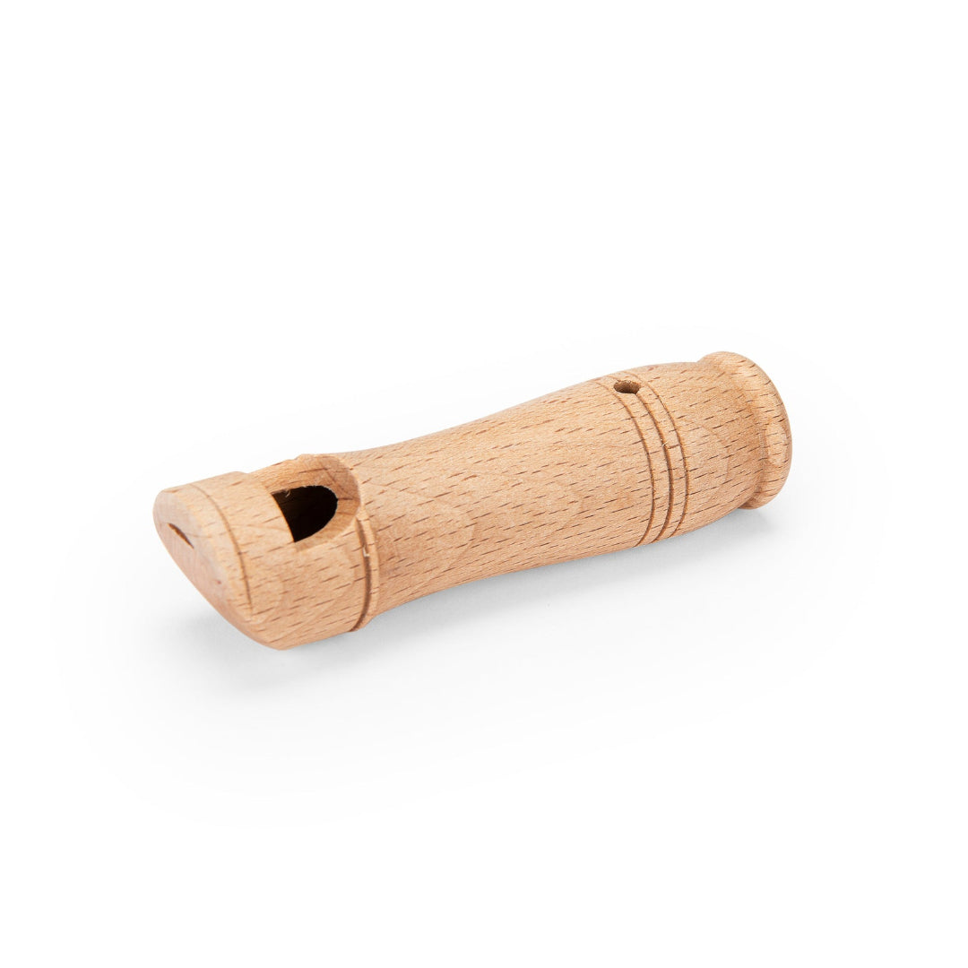 Wooden whistle on a white background