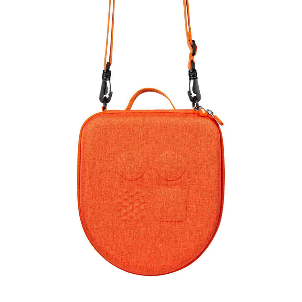 Orange seat cover with a face design on a white background
