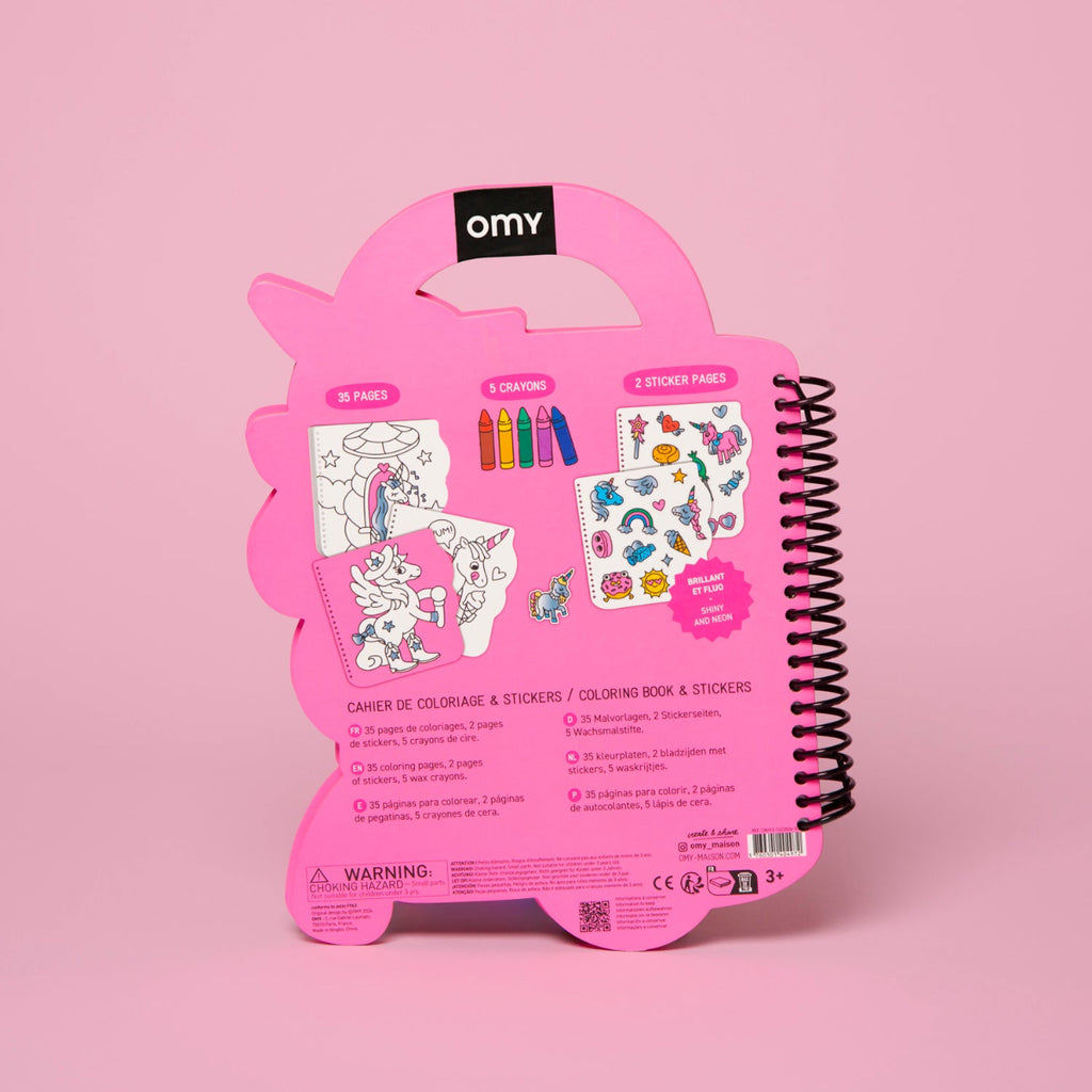 Pink coloring book and sticker set packaging with OMY branding on a pink background