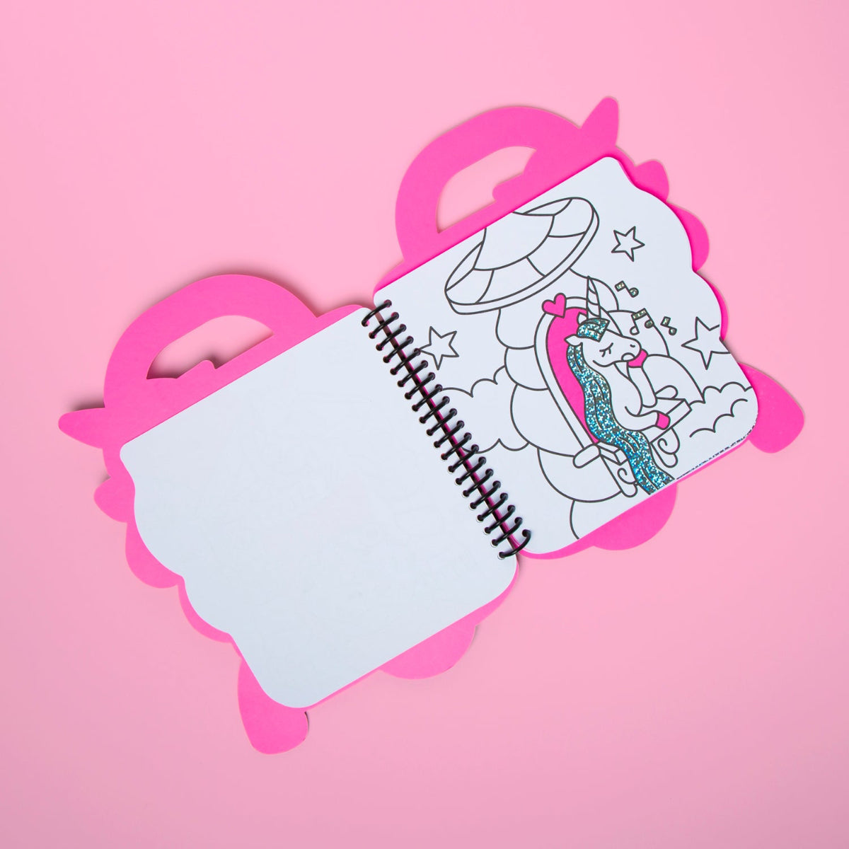 Coloring book with a unicorn design on a pink background