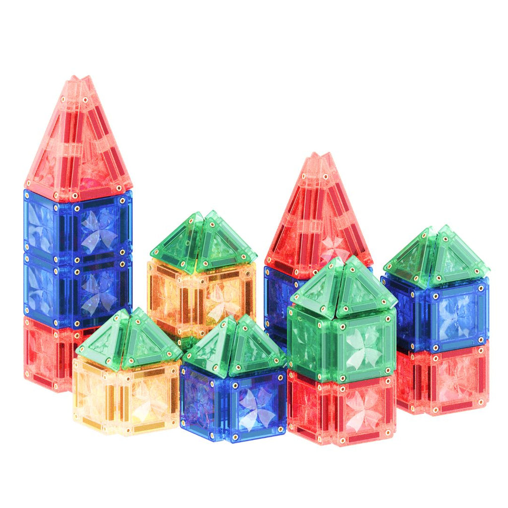 Colorful magnetic building blocks on a white background