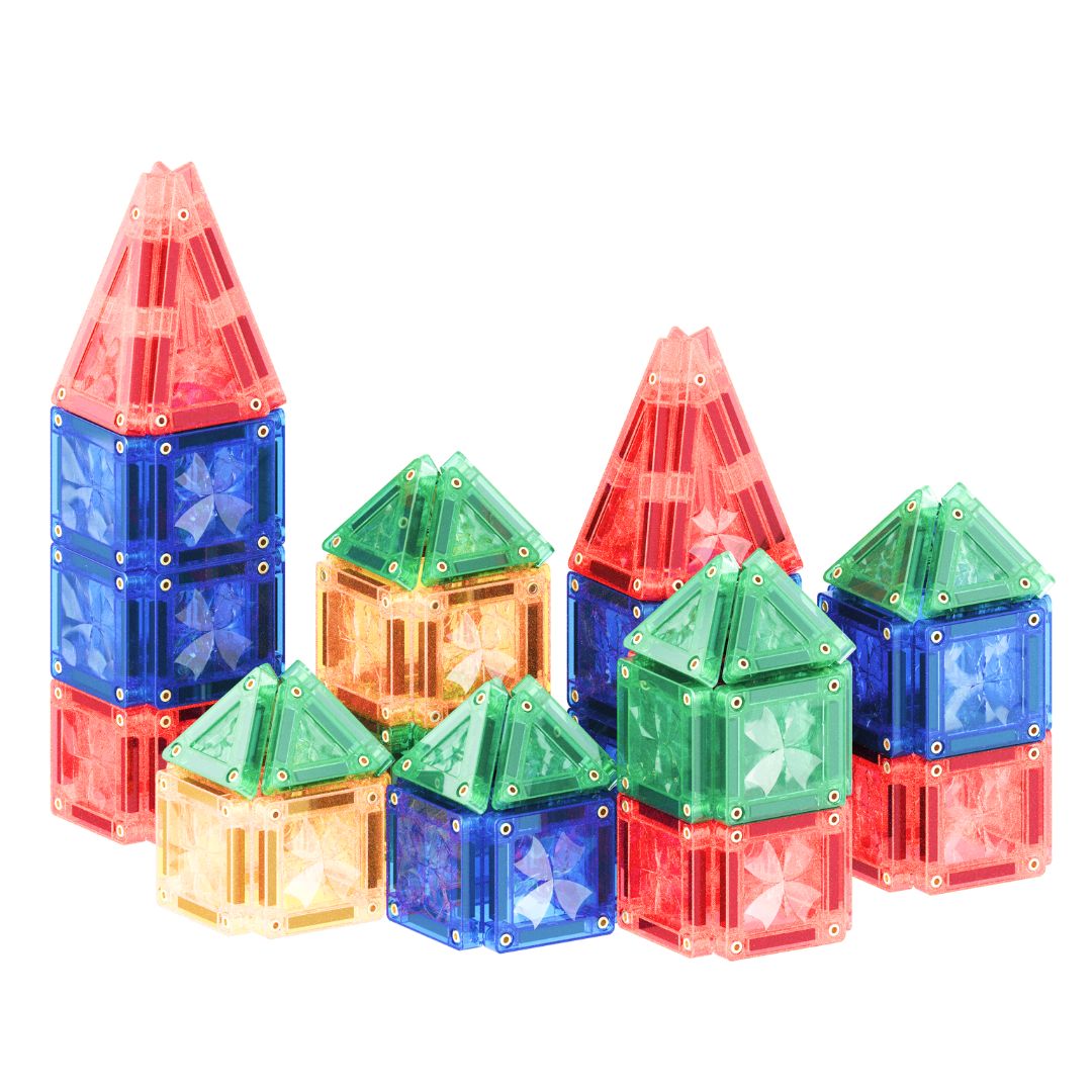 Colorful magnetic building blocks on a white background