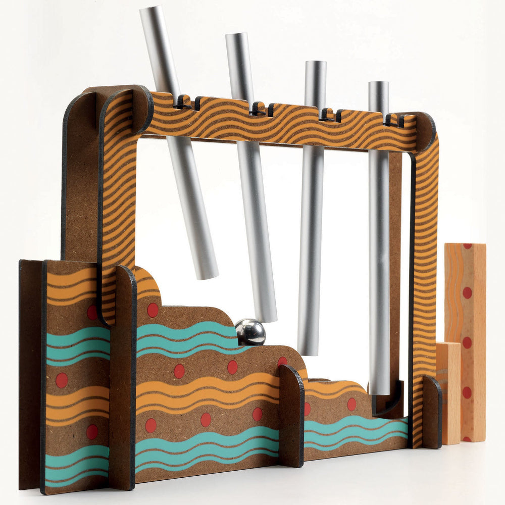 Wooden musical instrument with metal bars on a white background