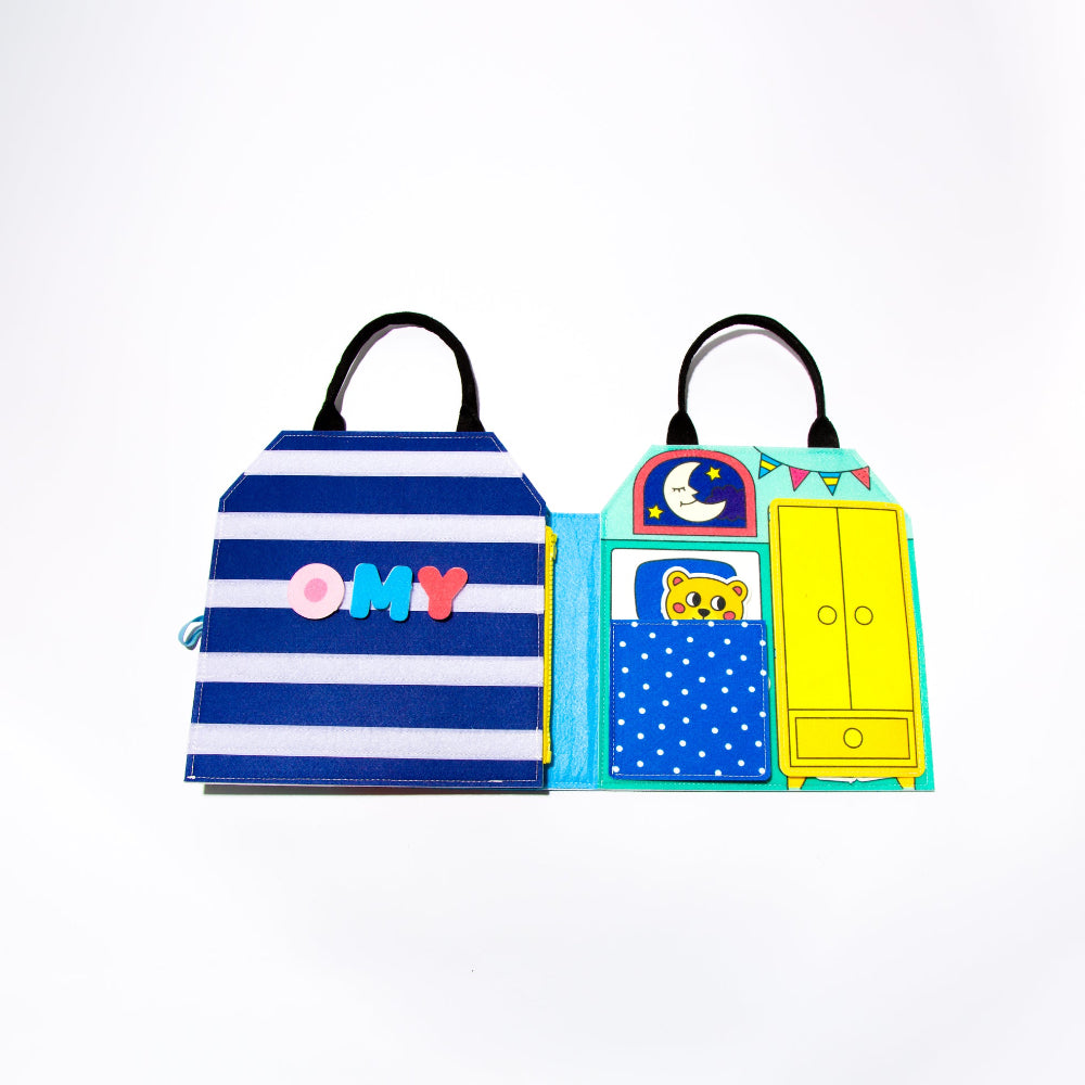 Children's toy with striped bag and colorful door design on a white background