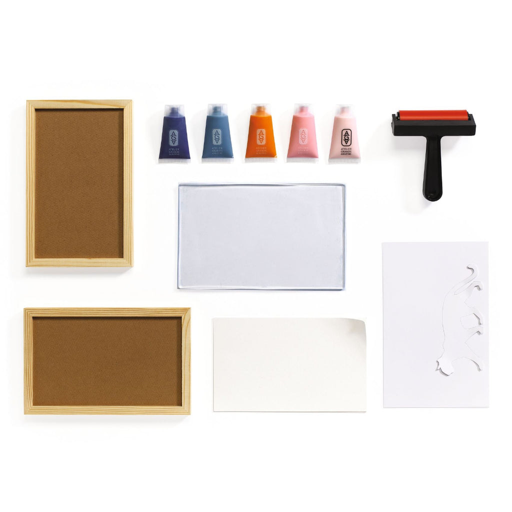 Set of art supplies including frames, ink bottles, and a roller on a white background