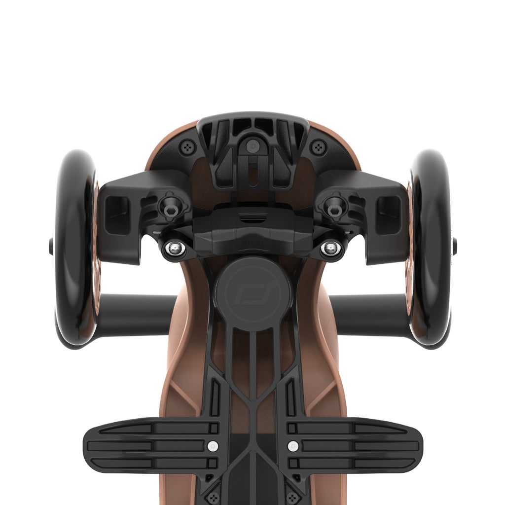 Close-up of a skateboard truck with brown deck and black hardware on a white background